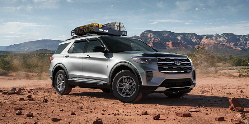 A grey 2025 Ford Explorer in the desert.